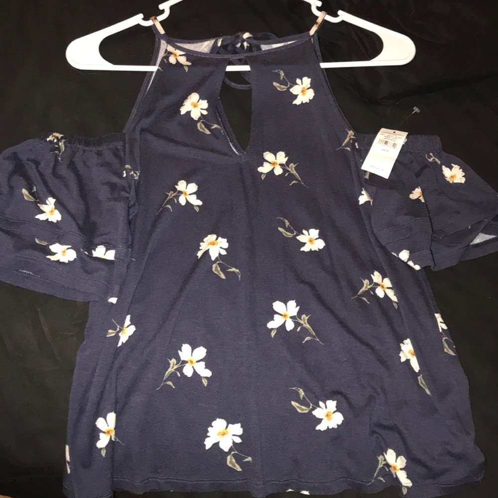 Navy blue floral top that ties in the back.